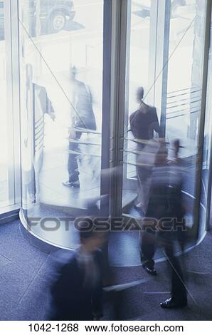 blur, walking, rush, door, busy, revolving door, motion View Large Photo Image Stock Photo - blur, walking, rush, door, busy, revolving door, motion. Fotosearch