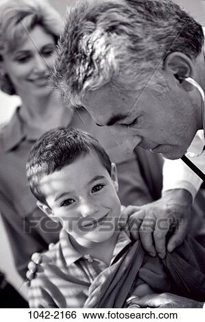 Stock Photograph - boy, health, concepts, challenges, mischievous, examinations, pediatrics. Fotosearch