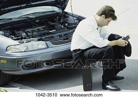 briefcase, car, broken, outdoors, transportation, frustrated View Large Photo Image Stock Image - briefcase, car, broken, outdoors, transportation, frustrated. Fotosearch