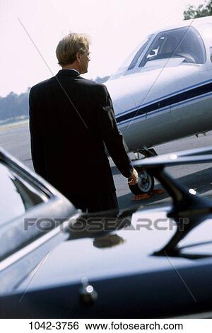 Stock Photograph - business, transportation, cars, aircraft, airports, business travel, Businesspeople transportation. Fotosearch
