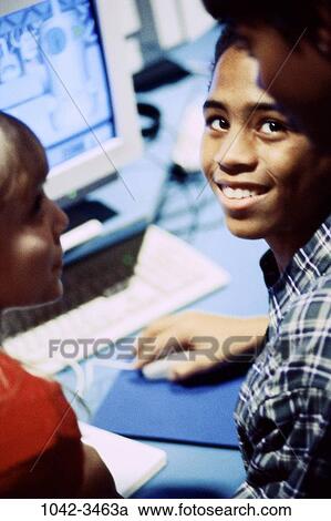 concentrating, smiling, classroom, school, sitting, curious, attentive View Large Photo Image Stock Image - concentrating, smiling, classroom, school, sitting, curious, attentive. Fotosearch