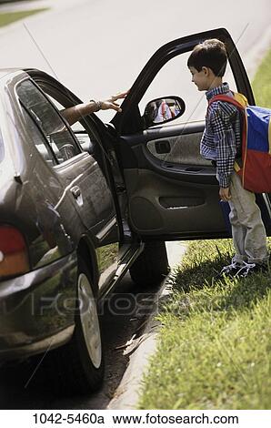 danger, car, boy, outdoors, child, reaching, grabbing View Large Photo Image Stock Image - danger, car, boy, outdoors, child, reaching, grabbing. Fotosearch