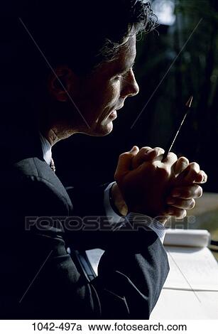 desk, Hispanic, business, contemplation, serious, clasping View Large Photo Image Stock Image - desk, Hispanic, business, contemplation, serious, clasping. Fotosearch