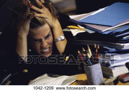 desk, woman, anger, paperwork, stress, business, frustrated View Large Photo Image Stock Photo - desk, woman, anger, paperwork, stress, business, frustrated. Fotosearch