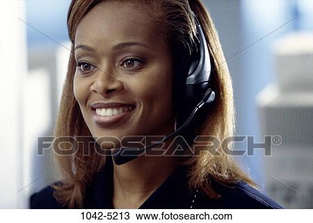 desk, woman, talking, conversation, business, Middle-aged, headphone View Large Photo Image Stock Image - desk, woman, talking, conversation, business, Middle-aged, headphone. Fotosearch