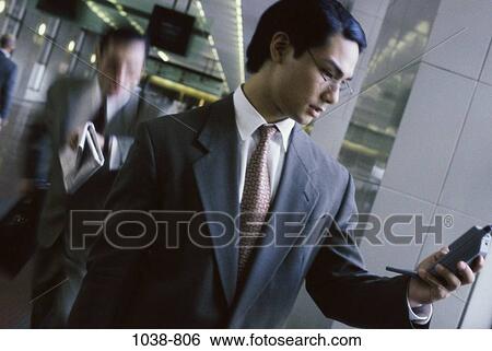 dial, dialing, telephone, Asian, phone, business View Large Photo Image Stock Photograph - dial, dialing, telephone, Asian, phone, business. Fotosearch