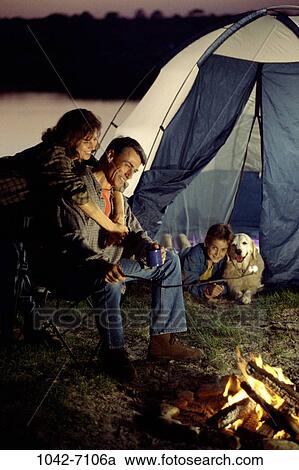 fire, people, smiling, night, dog, dusk, roast View Large Photo Image Stock Image - fire, people, smiling, night, dog, dusk, roast. Fotosearch