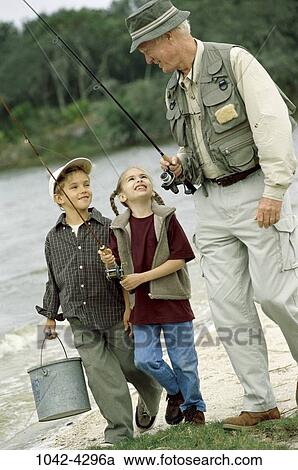 fish, people, hat, outdoors, poles, fishing, enjoyment View Large Photo Image Stock Image - fish, people, hat, outdoors, poles, fishing, enjoyment. Fotosearch