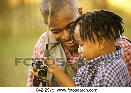 fish, people, smiling, outdoors, curious, nurturing View Large Photo Image Stock Photography - fish, people, smiling, outdoors, curious, nurturing. Fotosearch