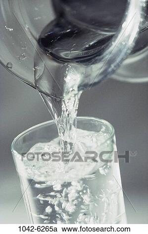 Stock Image - glass, water, pouring, flow, pitcher, still life. Fotosearch