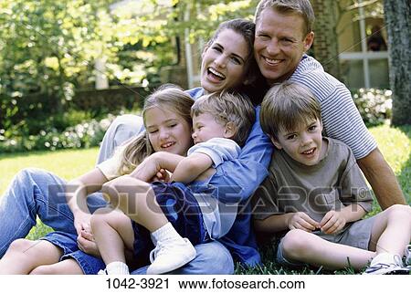 grass, people, sitting, holding, leaning, outdoors, hugging View Large Photo Image Stock Image - grass, people, sitting, holding, leaning, outdoors, hugging. Fotosearch