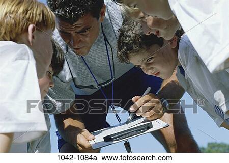 group, instructing, people, concentration, clipboard, outdoors, sports View Large Photo Image Stock Image - group, instructing, people, concentration, clipboard, outdoors, sports. Fotosearch