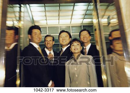 group, multiethnic, blur, smiling, riding, business View Large Photo Image Stock Photo - group, multiethnic, blur, smiling, riding, business. Fotosearch