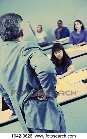 Stock Photograph - group, multiethnic, people, teacher, classroom, education, learning. Fotosearch