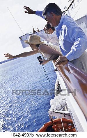 Stock Image - group, people, water, ship, transportation, tourism, deck. Fotosearch