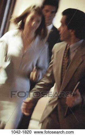 group, walking, rush, hallway, motion, business, hurry View Large Photo Image Stock Image - group, walking, rush, hallway, motion, business, hurry. Fotosearch