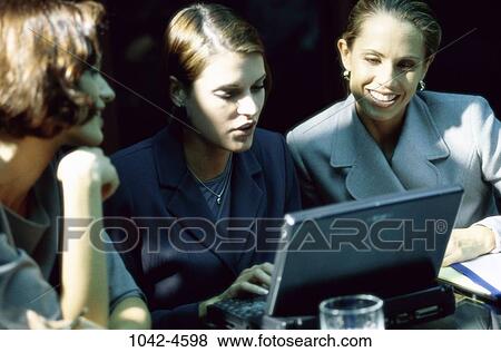 group, women, laptop, typing, business, executives, colleagues View Large Photo Image Stock Photo - group, women, laptop, typing, business, executives, colleagues. Fotosearch