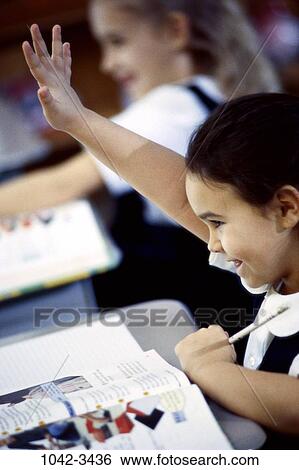 Stock Photograph - hand, girl, lifestyles, writing, education, student, learning. Fotosearch