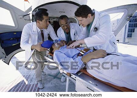 Picture - health, ambulance, emergency, medical, doctors, gurney. Fotosearch