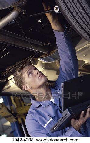industry, computer, car, laptop, transportation, checking View Large Photo Image Stock Photo - industry, computer, car, laptop, transportation, checking. Fotosearch
