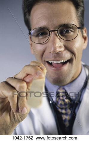 industry, eyeglasses, doctor, diagnosis, tongue, occupations, health View Large Photo Image Stock Image - industry, eyeglasses, doctor, diagnosis, tongue, occupations, health. Fotosearch
