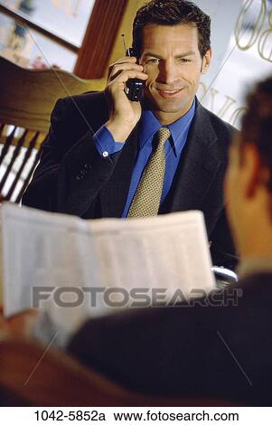 meeting, men, newspaper, talking, conversation, phone, business View Large Photo Image Stock Image - meeting, men, newspaper, talking, conversation, phone, business. Fotosearch