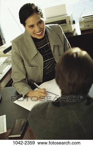 meeting, people, desk, consultation, business, writing, evaluation View Large Photo Image Stock Photo - meeting, people, desk, consultation, business, writing, evaluation. Fotosearch