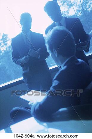 Stock Image - men, business, Middle-aged, teamwork, contemplation, executives, meetings. Fotosearch
