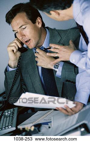 men, desk, telephone, discussion, phone, deal, stress View Large Photo Image Stock Image - men, desk, telephone, discussion, phone, deal, stress. Fotosearch