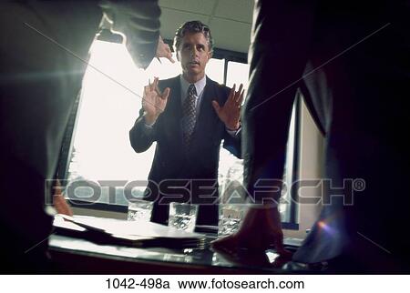 men, groups, desk, suit, defensive, business, concepts View Large Photo Image Stock Image - men, groups, desk, suit, defensive, business, concepts. Fotosearch