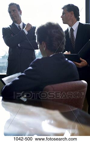 Stock Image - men, stress, business, challenges, Middle-aged, contemplation, executives. Fotosearch