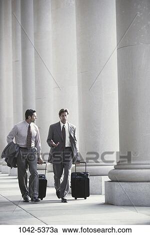 men, walking, luggage, business, outdoors, transportation, columns View Large Photo Image Stock Image - men, walking, luggage, business, outdoors, transportation, columns. Fotosearch