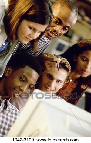 multiethnic, attentive, smiling, choices, classroom, concentrating, awe View Large Photo Image Stock Photo - multiethnic, attentive, smiling, choices, classroom, concentrating, awe. Fotosearch