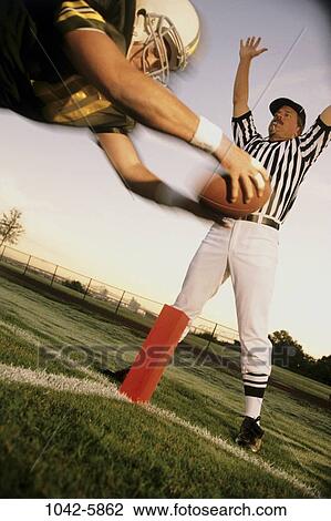 Stock Image - multiethnic, men, blur, playing, success, excitement, football. Fotosearch