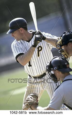 multiethnic, men, concentration, bat, baseball, sports, serious View Large Photo Image Stock Image - multiethnic, men, concentration, bat, baseball, sports, serious. Fotosearch