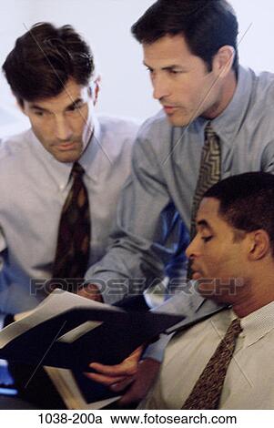 Stock Image - multiethnic, men, groups, business, concepts, challenges, chaotic. Fotosearch