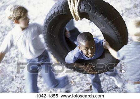 multiethnic, people, blur, smiling, playing, swinging View Large Photo Image Stock Photography - multiethnic, people, blur, smiling, playing, swinging. Fotosearch