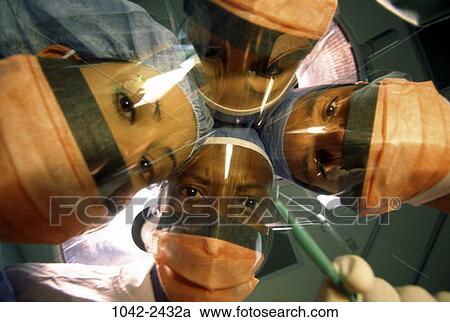 multiethnic, people, concentration, surgery, operating, concentrating, leaning View Large Photo Image Stock Image - multiethnic, people, concentration, surgery, operating, concentrating, leaning. Fotosearch