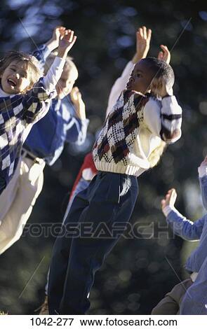 multiethnic, people, jump, jumping, excited, outdoors, joyous View Large Photo Image Stock Photo - multiethnic, people, jump, jumping, excited, outdoors, joyous. Fotosearch