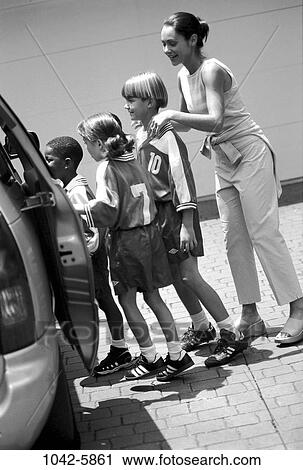 multiethnic, people, mother, car, outdoors, family, uniforms View Large Photo Image Stock Image - multiethnic, people, mother, car, outdoors, family, uniforms. Fotosearch