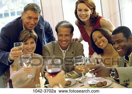 multiethnic, people, party, smiling, celebration, toasting, wine View Large Photo Image Stock Image - multiethnic, people, party, smiling, celebration, toasting, wine. Fotosearch