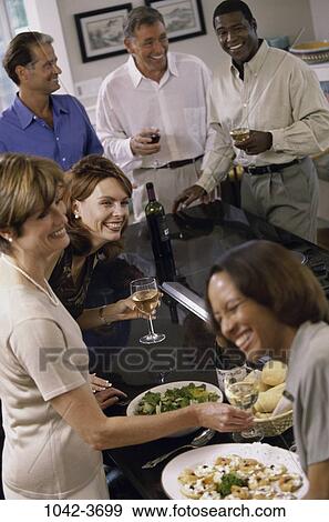 multiethnic, people, party, smiling, talking, conversation, wine View Large Photo Image Stock Photo - multiethnic, people, party, smiling, talking, conversation, wine. Fotosearch