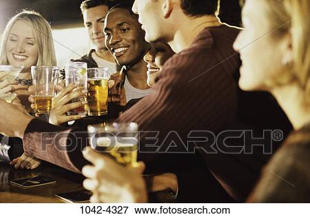 multiethnic, people, smiling, toasting, drinking, bar View Large Photo Image Stock Photo - multiethnic, people, smiling, toasting, drinking, bar. Fotosearch