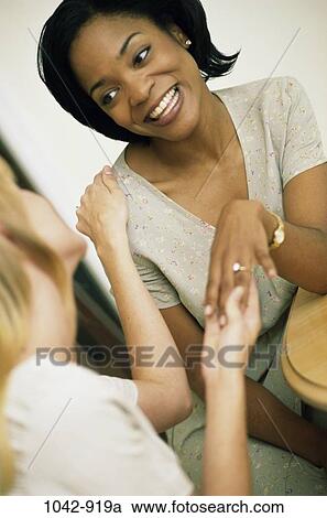 multiethnic, women, people, smiling, talking, choices, excited View Large Photo Image Stock Image - multiethnic, women, people, smiling, talking, choices, excited. Fotosearch