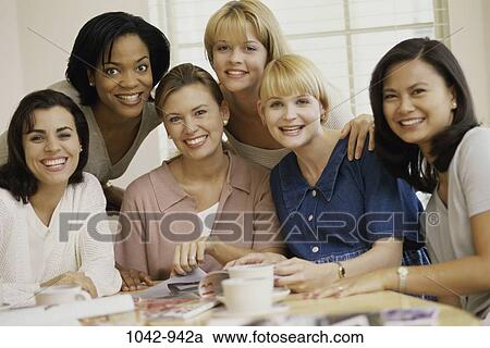 multiethnic, women, people, smiling, table, sitting View Large Photo Image Stock Image - multiethnic, women, people, smiling, table, sitting. Fotosearch
