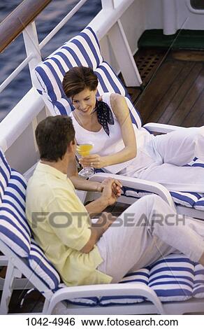overhead, people, hands, water, couple, ship, drinking View Large Photo Image Stock Photograph - overhead, people, hands, water, couple, ship, drinking. Fotosearch