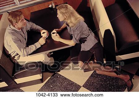 overhead, people, table, talking, couple, conversation, coffee View Large Photo Image Stock Image - overhead, people, table, talking, couple, conversation, coffee. Fotosearch