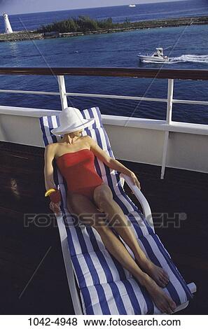 overhead, people, water, woman, hat, chair, ship View Large Photo Image Stock Photo - overhead, people, water, woman, hat, chair, ship. Fotosearch
