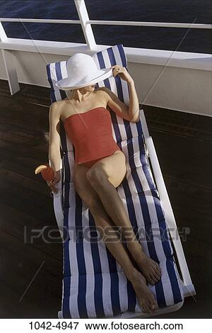 overhead, people, woman, hat, chair, ship, drinking View Large Photo Image Stock Photo - overhead, people, woman, hat, chair, ship, drinking. Fotosearch