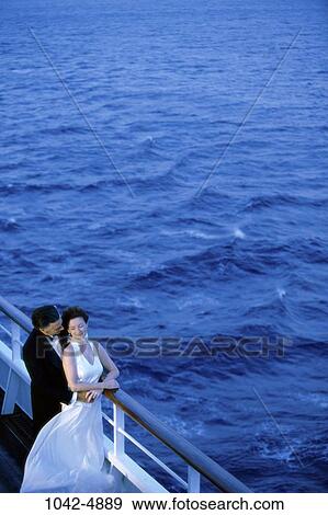 overhead, water, night, couple, ship, evening, outdoors View Large Photo Image Stock Photo - overhead, water, night, couple, ship, evening, outdoors. Fotosearch